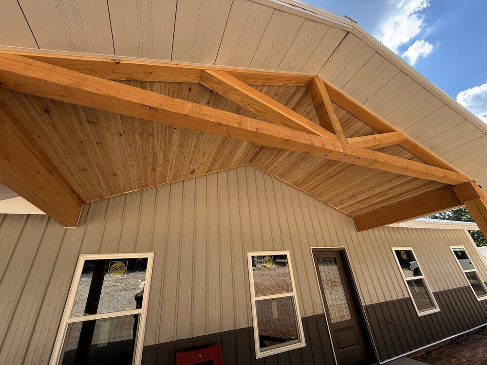 Steel framing during erection on the 2-bed lake barndominium.